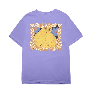 a purple t - shirt with a cartoon character on it