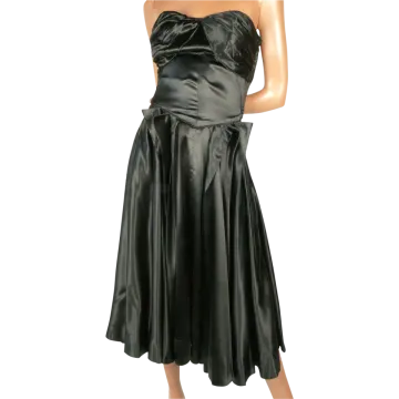 a woman wearing a black dress