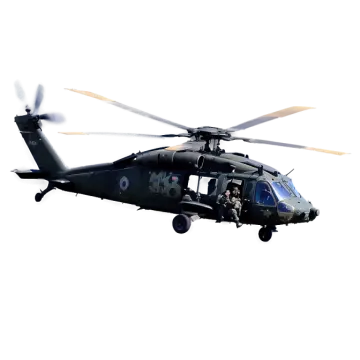 a military helicopter flying in the sky