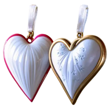 two white and pink heart shaped porcelain ornaments