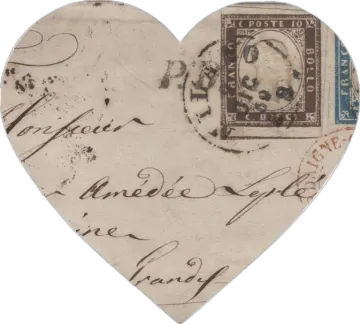 a heart shaped postcard with a stamp on it
