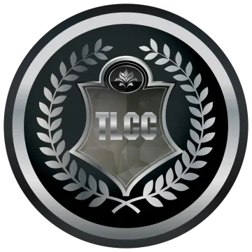 a black and silver badge with a laurel around it