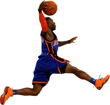 a man jumping in the air with a basketball