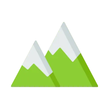 a mountain with green grass and white mountains