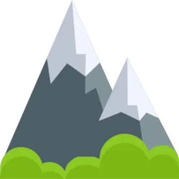 a mountain with trees in the fore