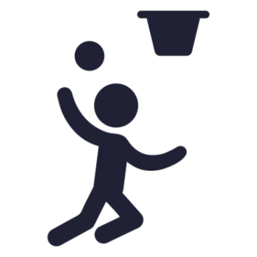a person throwing a ball into a bucket