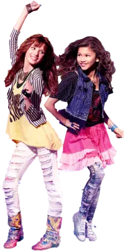 two young girls are dancing together