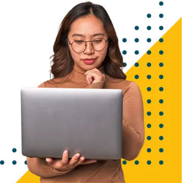 a woman with glasses holding a laptop computer