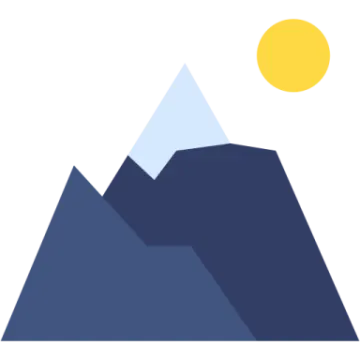 a mountain with the sun in the background