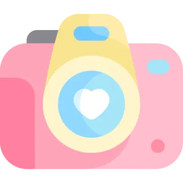 a pink camera with a heart on it