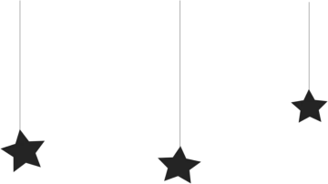 a black and white image of stars hanging from the ceiling