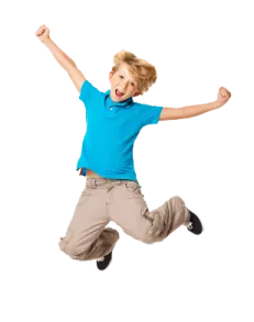 a young boy jumping in the air
