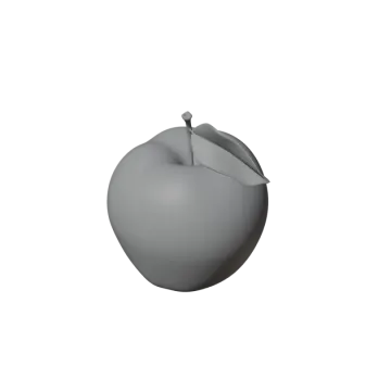 a gray apple sitting on top of a white surface