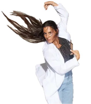a woman with long hair in the air