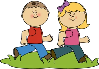 a boy and girl walking in the grass