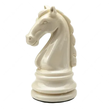 a white horse head on top of a chess piece