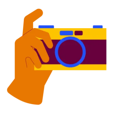 a hand holding a camera