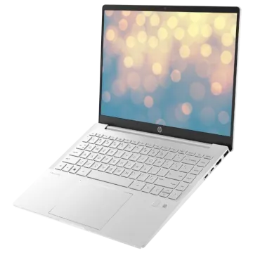 a laptop with a white keyboard on it