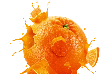 an orange splashing into the ground
