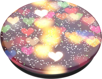 a round mirror with multi colored hearts on it