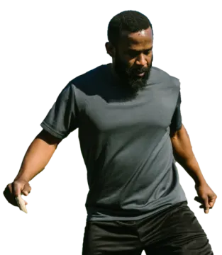 a man with a beard holding a baseball bat