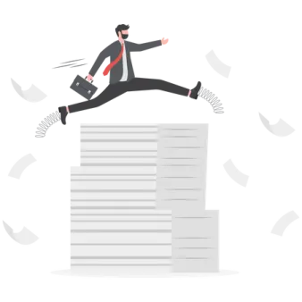 a man jumping over a stack of papers