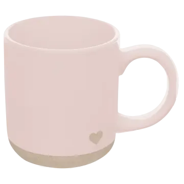 a pink mug with a heart on it