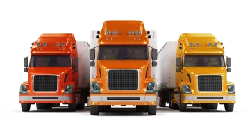 three trucks are lined up in a row