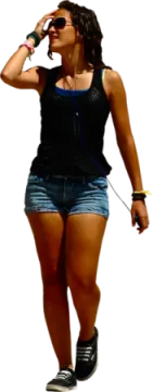 a woman walking while talking on a cell phone