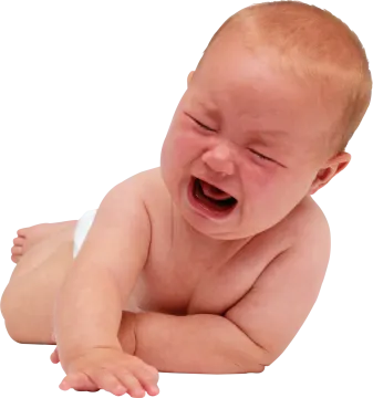 a baby is laughing while laying on the floor