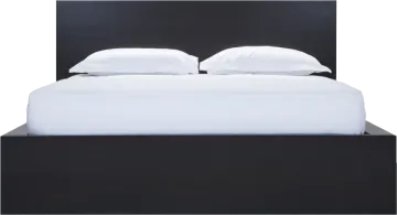 a bed with two pillows on top of it