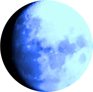 a blue moon with clouds in the background