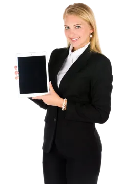 a woman in a business suit holding a tablet