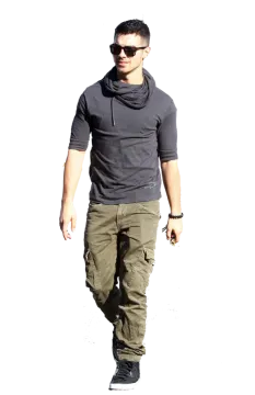 a man walking down the street wearing cargo pants