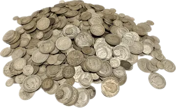 a pile of silver coins