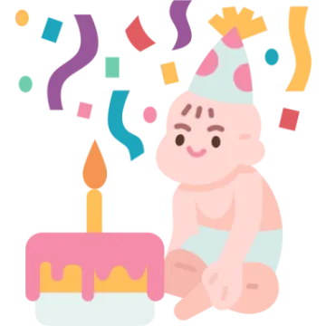 a baby sitting next to a birthday cake