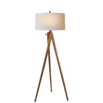 a wooden floor lamp with a white shade