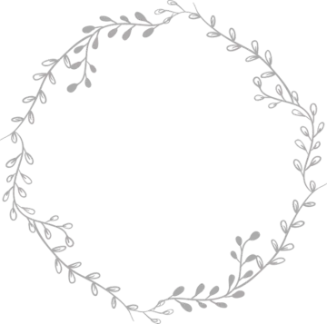 a circular frame with leaves in the middle