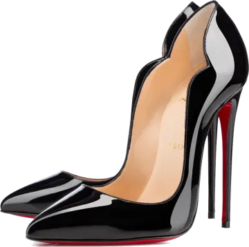 a pair of black shoes with red soles