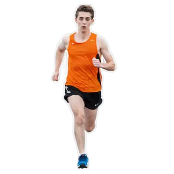a man running in an orange shirt and black shorts
