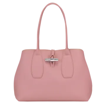 a pink handbag on a white background