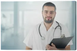 a man in a white shirt holding a clipboard