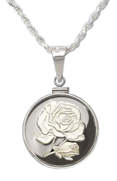 a white rose pendant on a silver chain