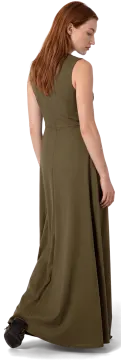a woman in a green dress and black shoes