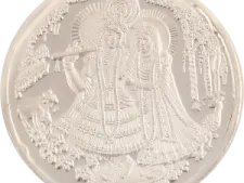 a silver coin with an image of the goddess
