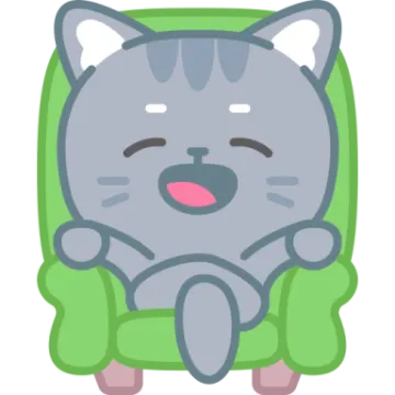 a gray cat sitting in a green chair
