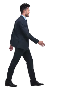 a man in a suit and tie walking