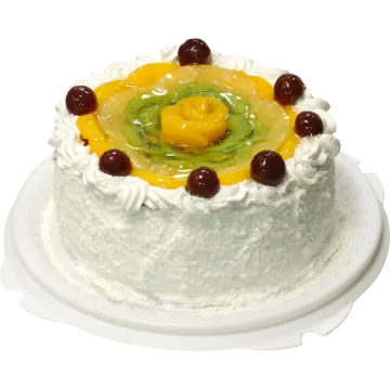 a white cake with fruit on top