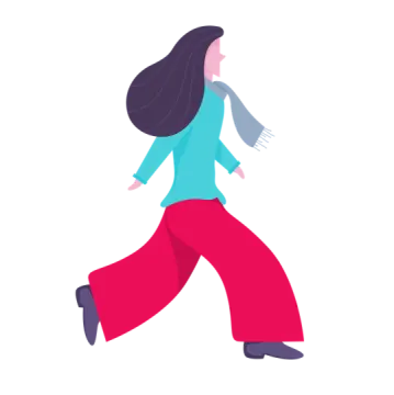 a woman in red pants and blue shirt walking