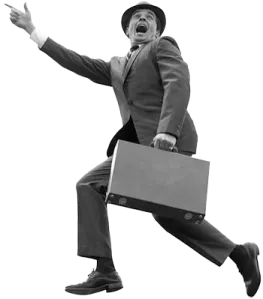 a man in a suit and hat running with a briefcase